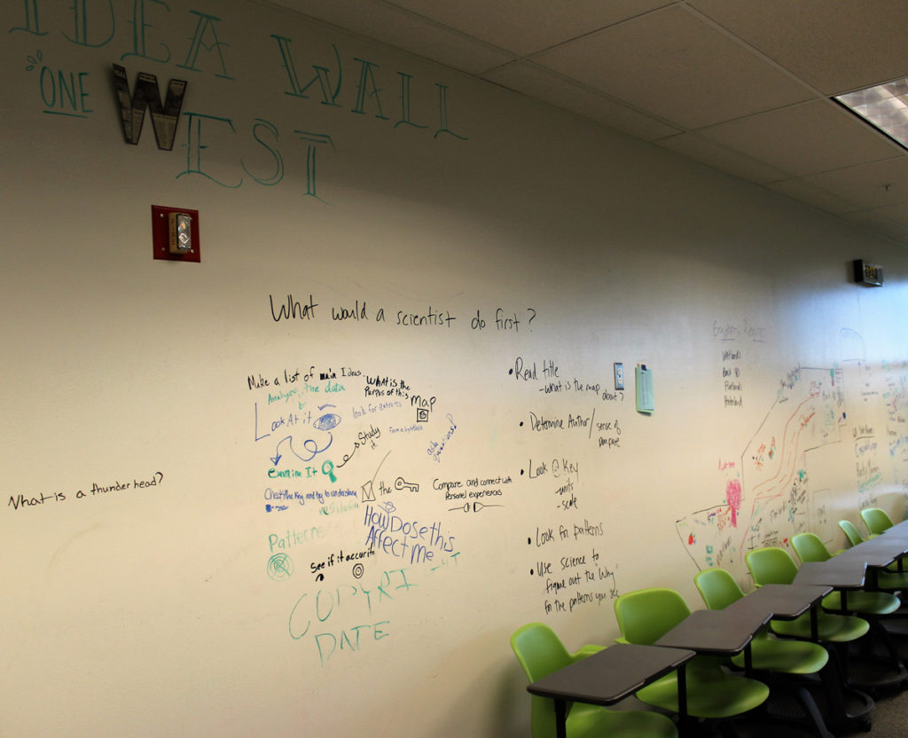 Witeborads like this "idea wall" combined with open, flexible spaces an mobile furniture give the new Project Based Learning Middle School a futuristic look