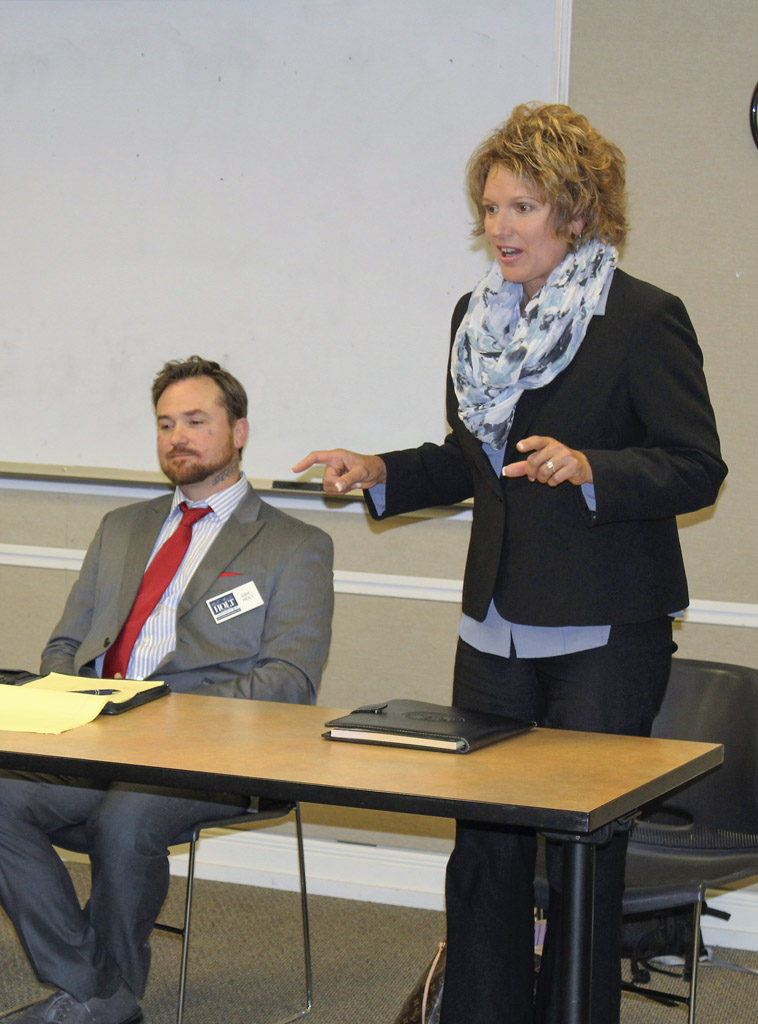 Rep. Liz Pike (right), a Republican incumbent from Legislative District 18, which represents residents in six of Clark County’s seven cities as well as several areas of unincorporated Clark County, speaks at a bipartisan candidates forum, held Wed., Oct. 12 at the Camas Library, while candidate Eric Holt (left) looks on. Photo by Kelly Moyer