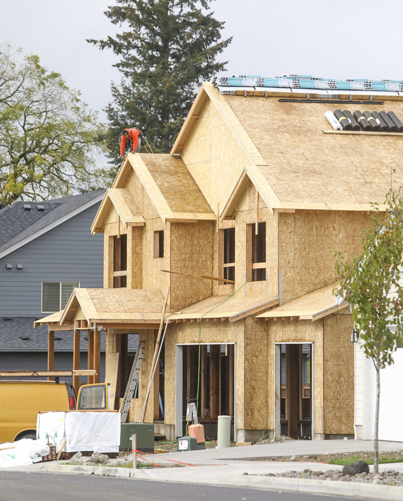 Clark County Community Development issued 1,105 Single Family Residential permits in September 2016, which represents a 16.7 percent increase over September 2015. Shown here is a home currently under construction in Ridgefield’s Pioneer Canyon. Photo by Mike Schultz