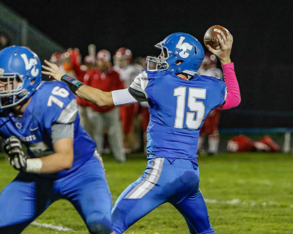 La Center quarterback Jeremy Scott (15) throws a pass against Castle Rock.