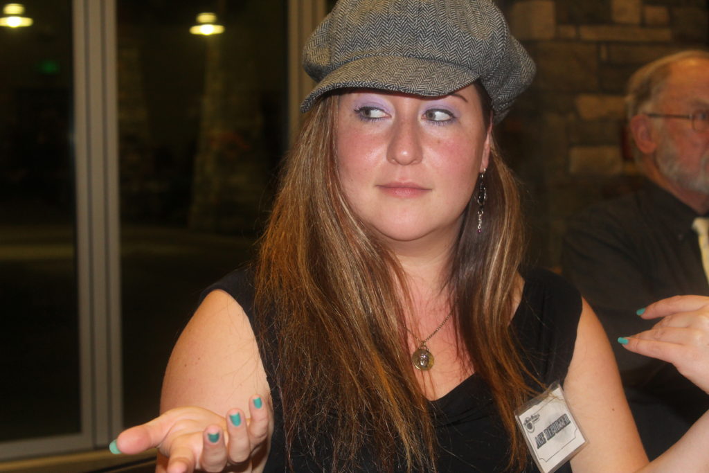 ClarkCountyToday.com reporter Joanna Yorke was selected to play none other than “Ace Reporter” during the murder mystery experience at the Scare Away Hunger dinner and auction. Ace (Yorke) was a suspect in the murder of Lou Zar, but it turned out she was not the murderer. Photo by Marvin Case