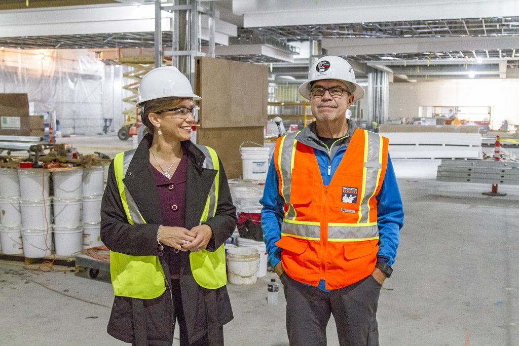 Kara Fox-LaRose (left), project manager of the ilani resort, and Cowlitz Indian Tribe Chairman Bill Iyall tour the construction site of the $510 million casino-resort being built on the Cowlitz Indian Reservation near La Center in north Clark County. Photo by Mike Schultz