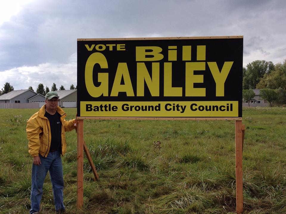 Late Battle Ground City Council Member Bill Ganley is shown here putting up campaign signs the last time he ran for re-election to the council. Ganley passed away Saturday morning after fighting carcinoid cancer. Photo from Shane Bowman's Facebook page