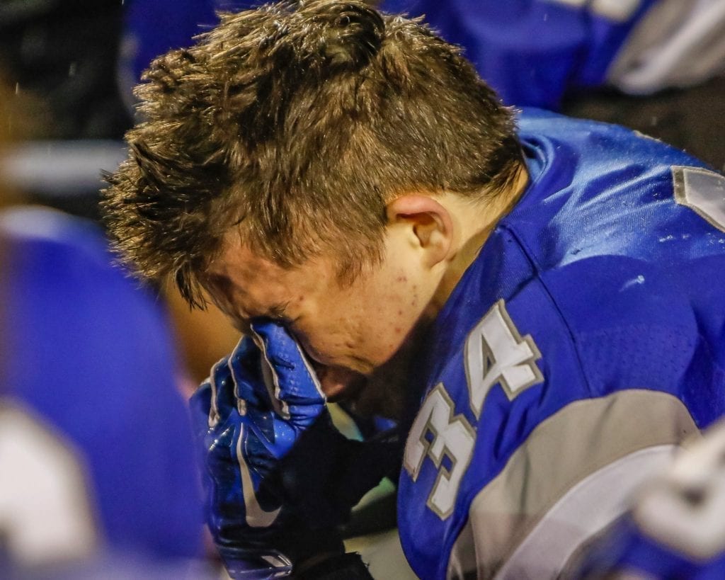 La Center running back Jeffrey Mayolo (24) is emotional after being eliminated by Connell in the semifinals. Photo by Mike Schultz.