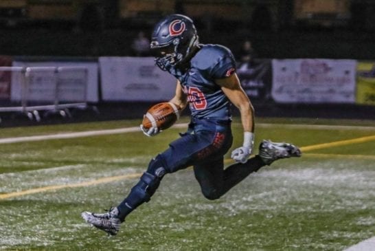 camas-high-school-football-running-back-elias-bashir-soaring-over-goal-line-touchdown-playoff-win-over-enumclaw-high-school-football