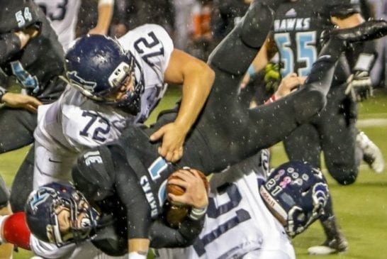 hockinson-high-school-football-wide-receiver-wyatt-jones-uphended-by-the-black-hills-high-school-football-defense