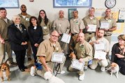 Humane Society and Larch Corrections celebrate first ‘graduating’ class of dogs