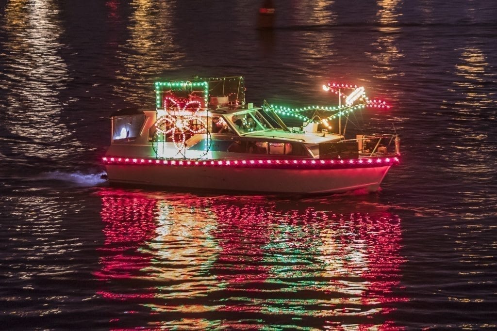 Individual boat owners spend their own time and money decorating their vessels for the annual Christmas Ships Parade each year. Photo by Mike Schultz
