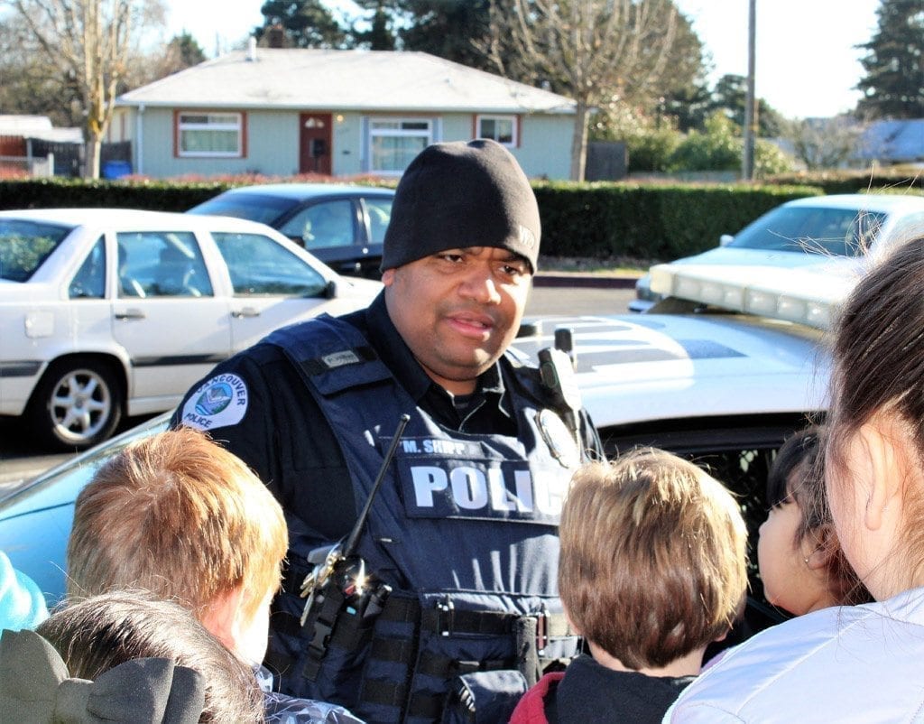 Vancouver Police Activities League, police officers share love of reading, stress gun safety with local third-graders