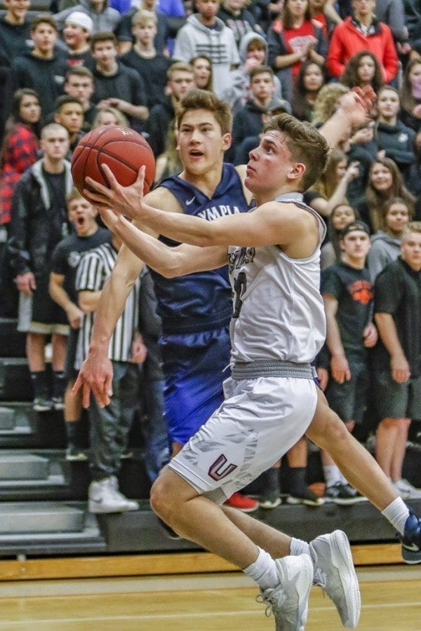 Union opened postseason play with a 72-48 win over Olympia in a Class 4A boys bi-district basketball tournament game played Thursday at Union High School. The Titans advance to meet Bellarmine Prep at Mount Tahoma High School in the quarterfinals of the tournament.