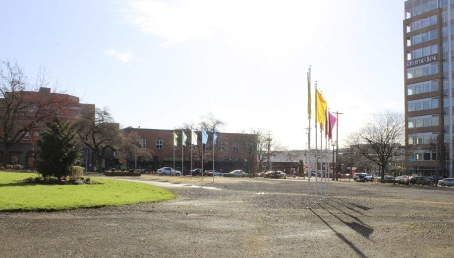 Located at the corner of 8th and Washington streets in downtown Vancouver, the 1-acre city-owned parcel known as “Block 10” used to be the site of the Lucky Lager Brewery, which closed in 1985. Now, a developer hopes to turn the vacant lot into a mixed-use project with an urban grocery store, 250 apartments and ground-floor retail shops. Photo by Kelly Moyer