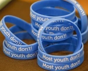 At a recent discussion forum with Battle Ground Police Chief Bob Richardson community members were invited to learn more about legal marijuana and how to prevent youth from using marijuana. A group of students who attended the event had these bracelets available, pledging that they will not do any drugs. Photo by Mike Schultz