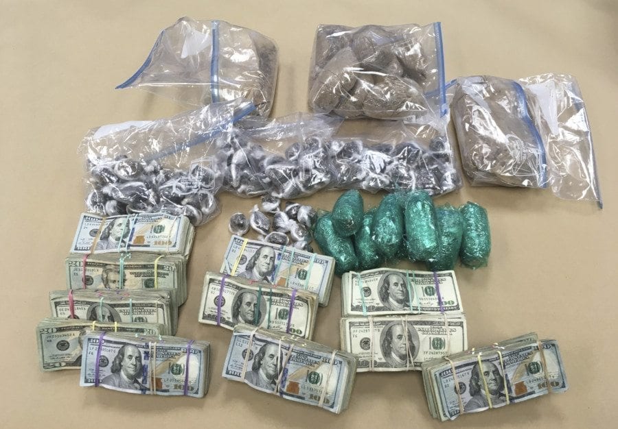 Detectives from the Clark-Vancouver Drug Task Force served two search warrants Thursday and seized 11.25 pounds of suspected heroin and over $51,000 in cash from a home in east Vancouver. Photo courtesy of Clark County Sheriff’s Office