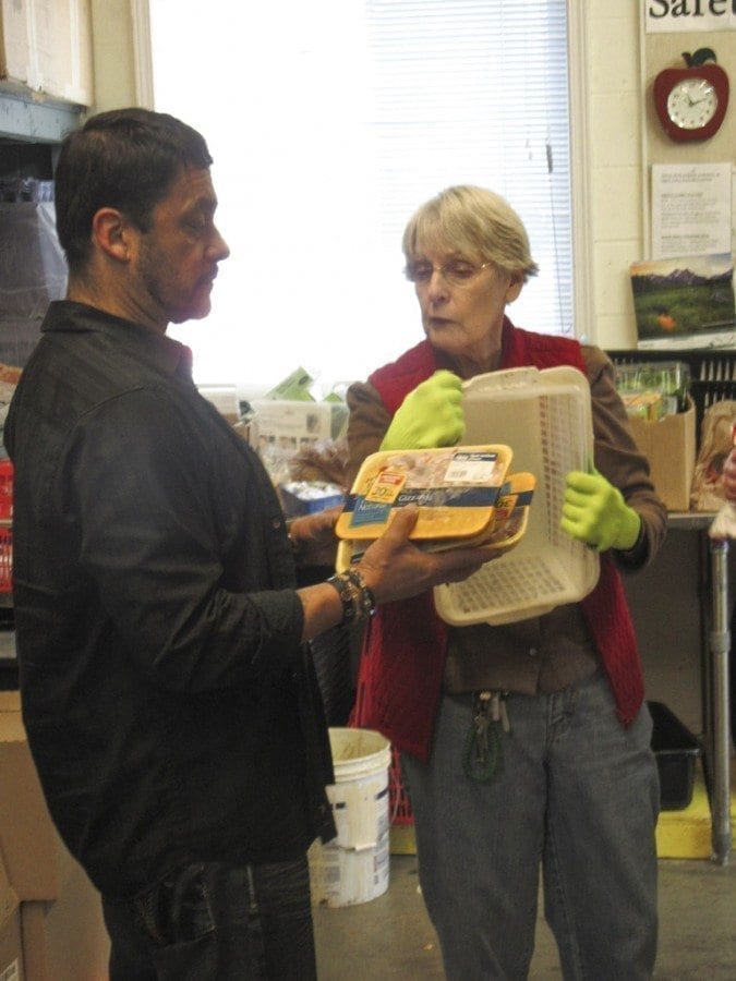 "(Pat) goes a mile a minute,” says North County Community Food Bank Executive Director Elizabeth Cerveny about volunteer Pat Jeschke. “When she sees something that needs doing, she jumps in and does it. She has a big heart. And she also mentors new volunteers.” Here, Jeschke works with fellow volunteer Raúl Pelaéz. Photo courtesy of Carolyn Schultz-Rathbun