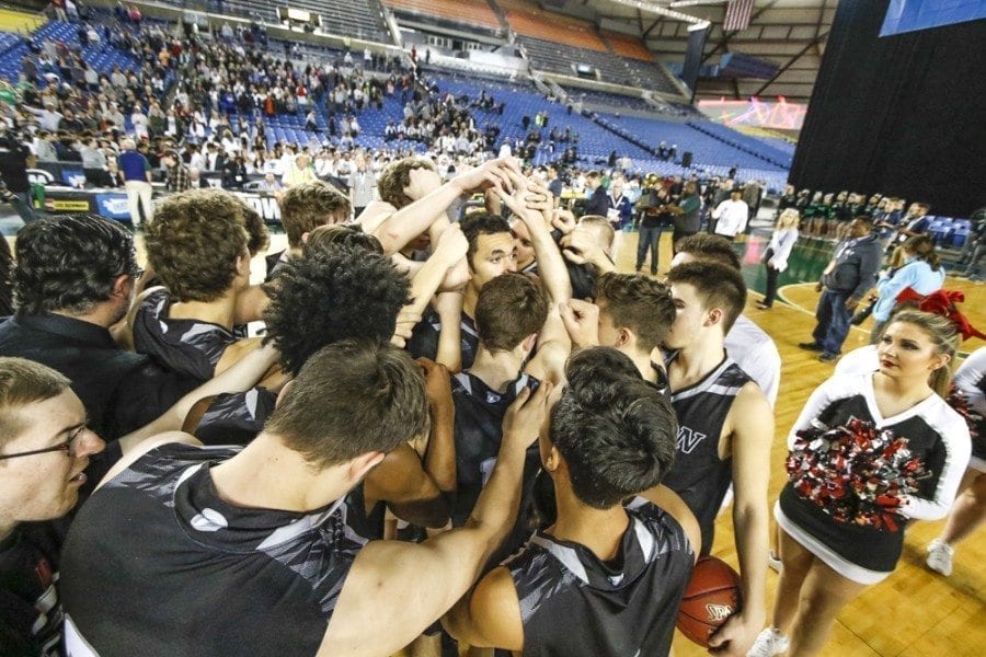 Union’s players, coaches and fans shook off the disappointment of the Titans’ 81-61 loss to Kentwood in Saturday’s championship game at the Tacoma Dome in time to share some special moments celebrating an exceptional season. Photo by Mike Schultz