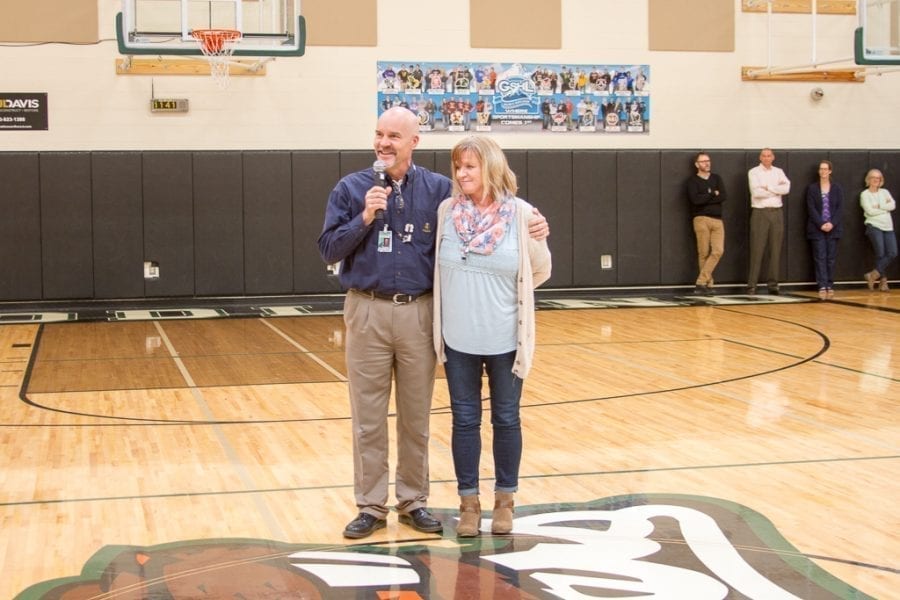 Woodland High School Career Counselor Mary Ann Sturdivan was recognized by Principal John Shoup at a recent WHS school assembly. Sturdivan was named ESD 112 Region Classified School Employee of the Year. Photo courtesy of ESD 112