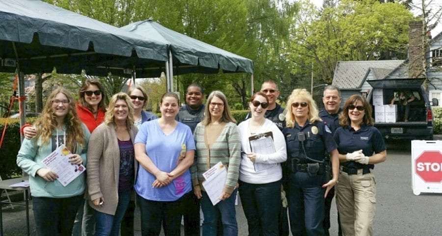 Volunteers from Prevent Coalition, Unite! Washougal, Fort Vancouver High School, and officers from Vancouver Police Department are shown here at the PeaceHealth Memorial take back site. Photo courtesy of Education Service District 112