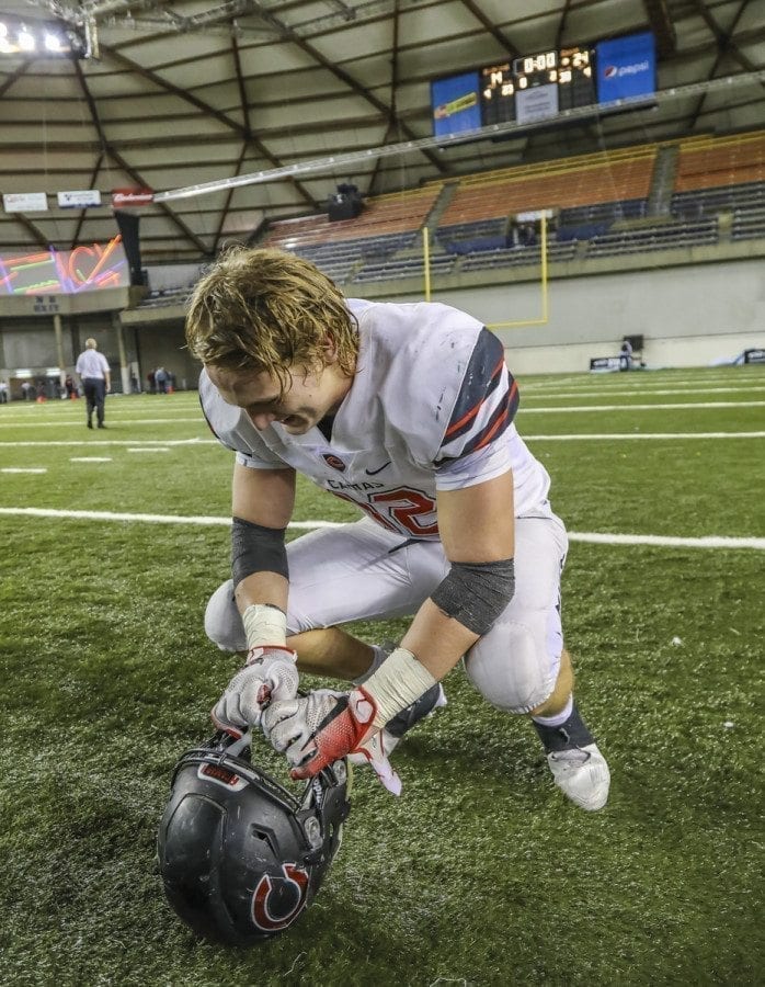 Michael Matthews takes a moment to savor victory after Camas claimed the state Class 4A state football championship. Photo by Mike Schultz