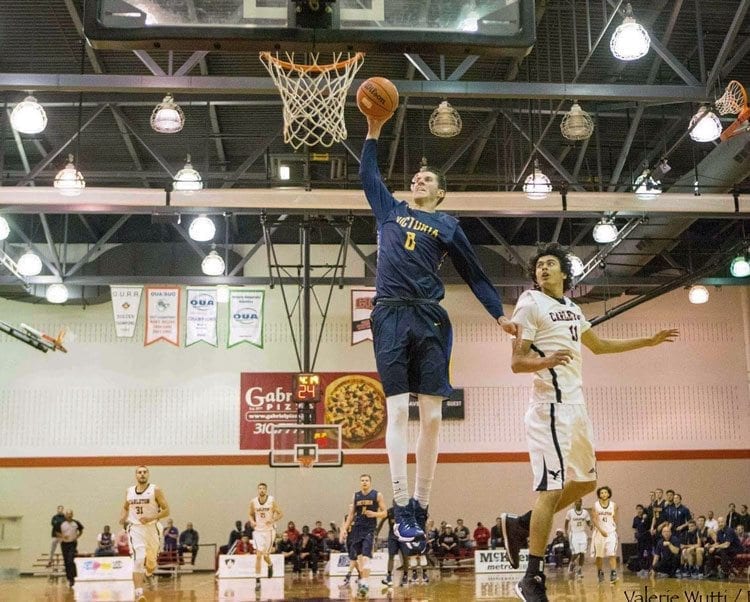 Grant Sitton soars to the hoop while playing for the University of Victoria in Canada. The 2011 Prairie High School graduate took a while to develop his game but now is overseas preparing for his first season of pro ball. Photo courtesy of Sitton family