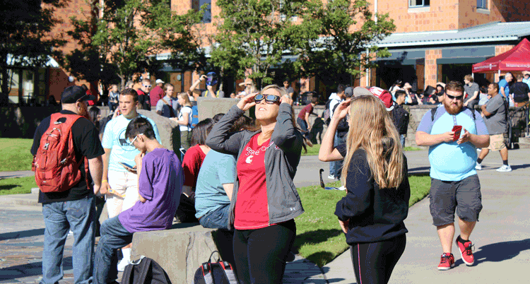 A telescope was set up at an event at Washington State University Vancouver to allow for indirect viewing of the eclipse as the moon’s shadow passed over the sun Monday. Photo by Alex Peru