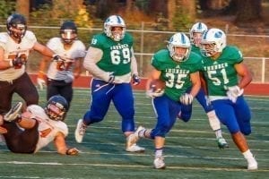 Mountain View’s Andrew Gulliford (35), shown here rushing the football against Battle Ground, was named the Co-Defensive Player of the Year in a vote of the Class 3A Greater St. Helens League coaches. Photo by Mike Schultz