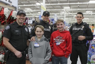 Battle Ground children shop with a cop