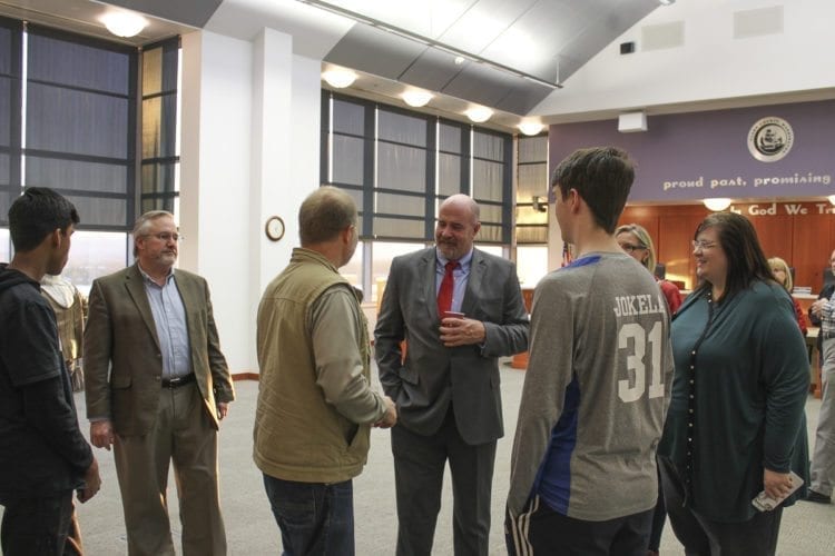 Dan Chandler (fourth from left) speaks to attendees at an open house held in the Board of County Councilors hearing room on Monday as part of a two-day interview and selection process to select the new county manager. Photo by Alex Peru