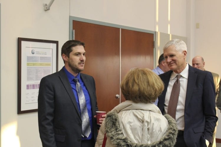 Randall Partington (left) attended an open house Monday evening to meet the public and local Clark County officials as part of a two-day interview and selection process for the new county manager. Photo by Alex Peru