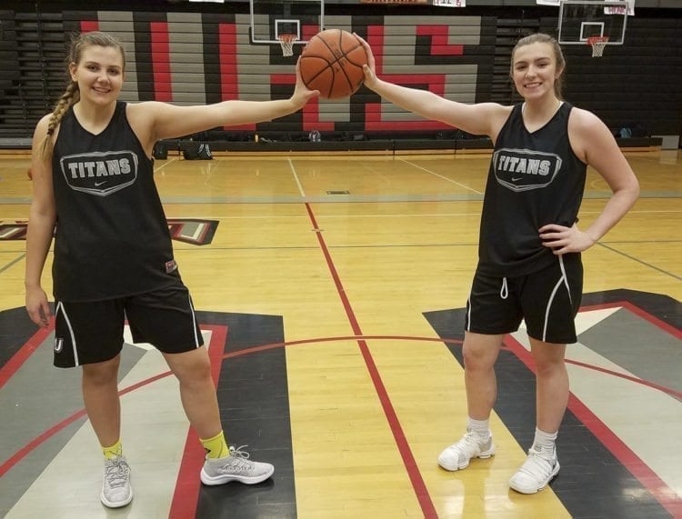 Courtney Cranston (left) and Mackenzie Lewis of Union have been close friends for years. The teammates found out in the fall that they are cousins, and they are having fun with the new discovery. Photo by Paul Valencia