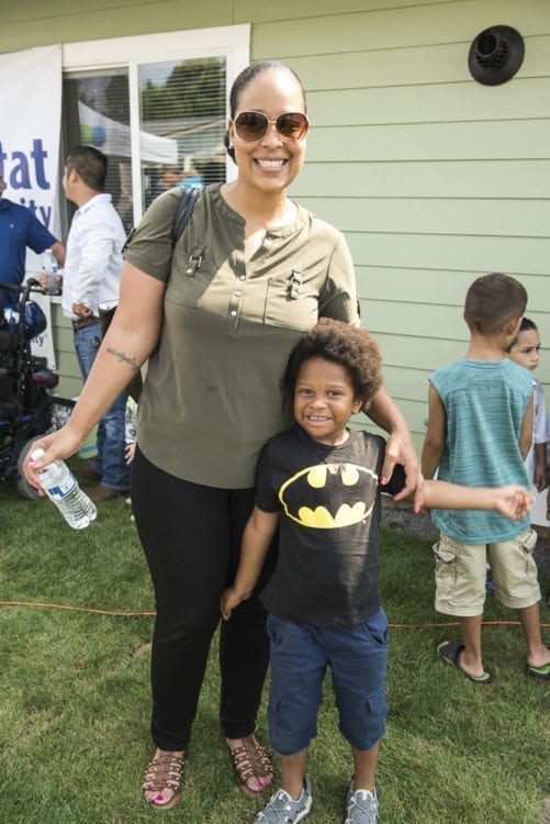 Dakota Palmore (left) and her sons will enjoy the stability of home ownership thanks to efforts of Evergreen Habitat for Humanity. Photo courtesy of Evergreen Habitat for Humanity