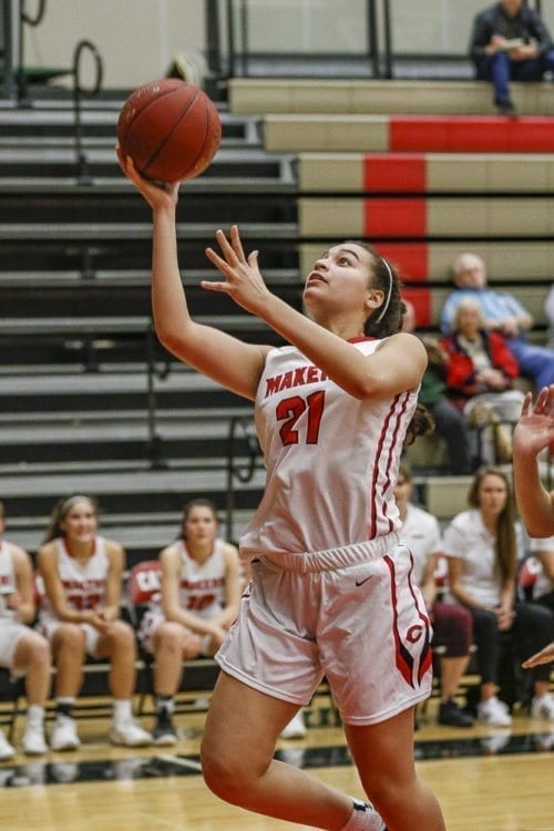 Marianna Payne (21) led Camas with 12 points Thursday in a win over Hazen. She had a blocked shot in overtime to keep the game tied, then scored the go-ahead basket with 42 seconds left. Photo by Mike Schultz