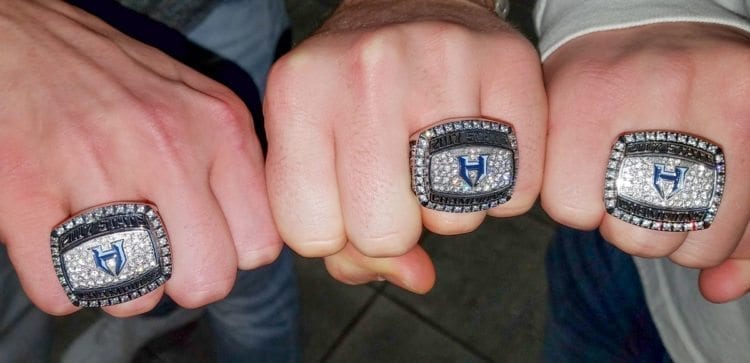 Here are the championship rings, made by Jostens, and how they look on the fingers of state champion Hockinson Hawks. Photo by Paul Valencia