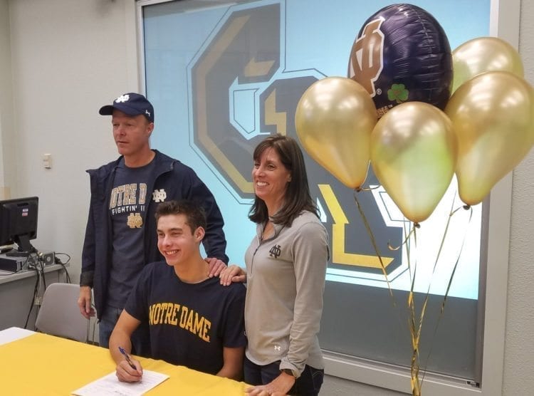 Josh Bottelberghe of Columbia River signed his letter of intent to swim for Notre Dame back in December. His parents, Rolland and Sheri, have had three children swim for Columbia River and excel in college. Photo by Paul Valencia
