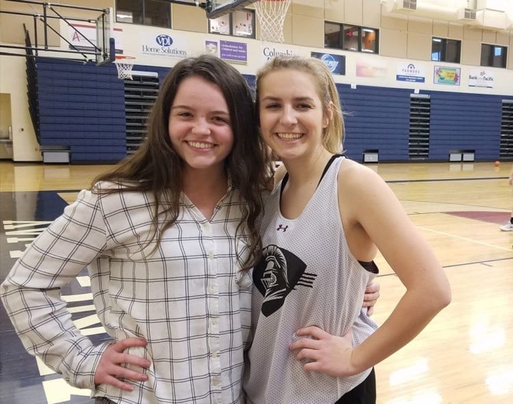 Tyra Schroeder (left) and Hannah Moats are the captains for King’s Way Christian, a team that just finished a 16-4 regular season. The Knights are one of the surprises of the girls basketball season in Clark County. Photo by Paul Valencia
