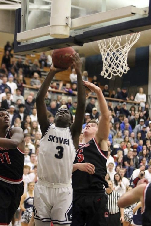 Samaad Hector uses his height and strength to get inside position for the Skyview Storm. Photo courtesy of Sports Mom Photos