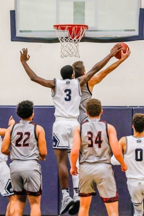 Skyview’s Samaad Hector (3) usually gets at least one blocked shot a game for the Storm. He also set the school record for most rebounds in a season and in a game. Photo by Mike Schultz