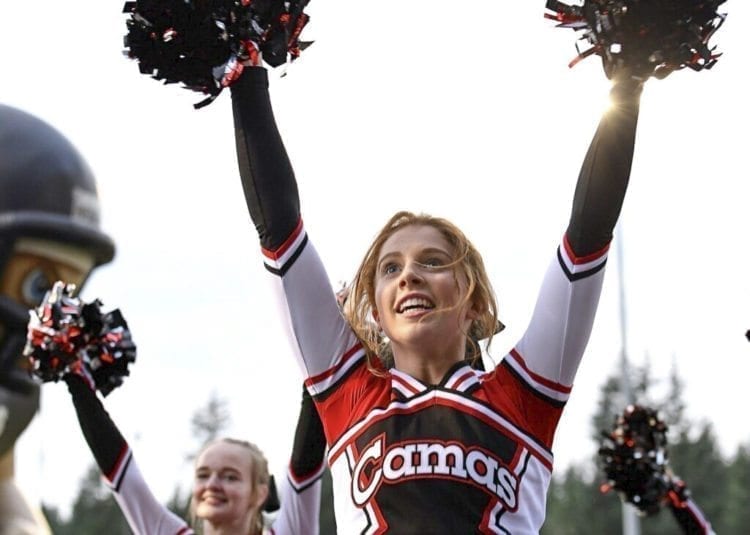 Camas senior Maddy Peffers knows that cheer is not a sanctioned sport in Washington. Still, it takes serious athletic skills to perform at a high level. She describes her teammates as “family,” and to them, it is a sport, because of the work they put into it. Peffers also is a state champion in track and field. Photo by Kris Cavin