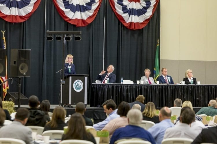 County Councilor Jeanne Stewart addresses the crowd at the 2018 State of the County Address. Also pictured, from left to right, County Chair Marc Boldt, Councilor Julie Olson, Councilor John Blom, and Councilor Eileen Quiring. Photo by Mike Schultz