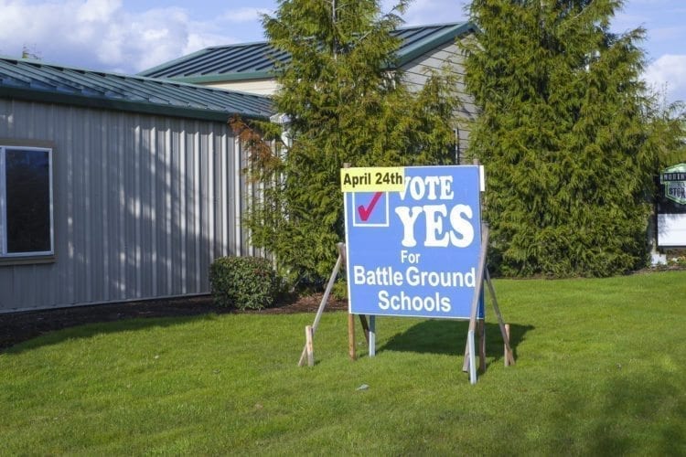 A sign along SR-502 in Battle Ground urges voters to approve the school bond on April 24. Photo by Chris Brown