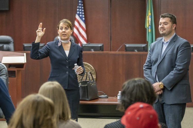 Sen. Ann Rivers, left, and state Rep. Brandon Vick, right, meet with constituents during a town hall in Battle Ground Saturday. Photo by Mike Schultz