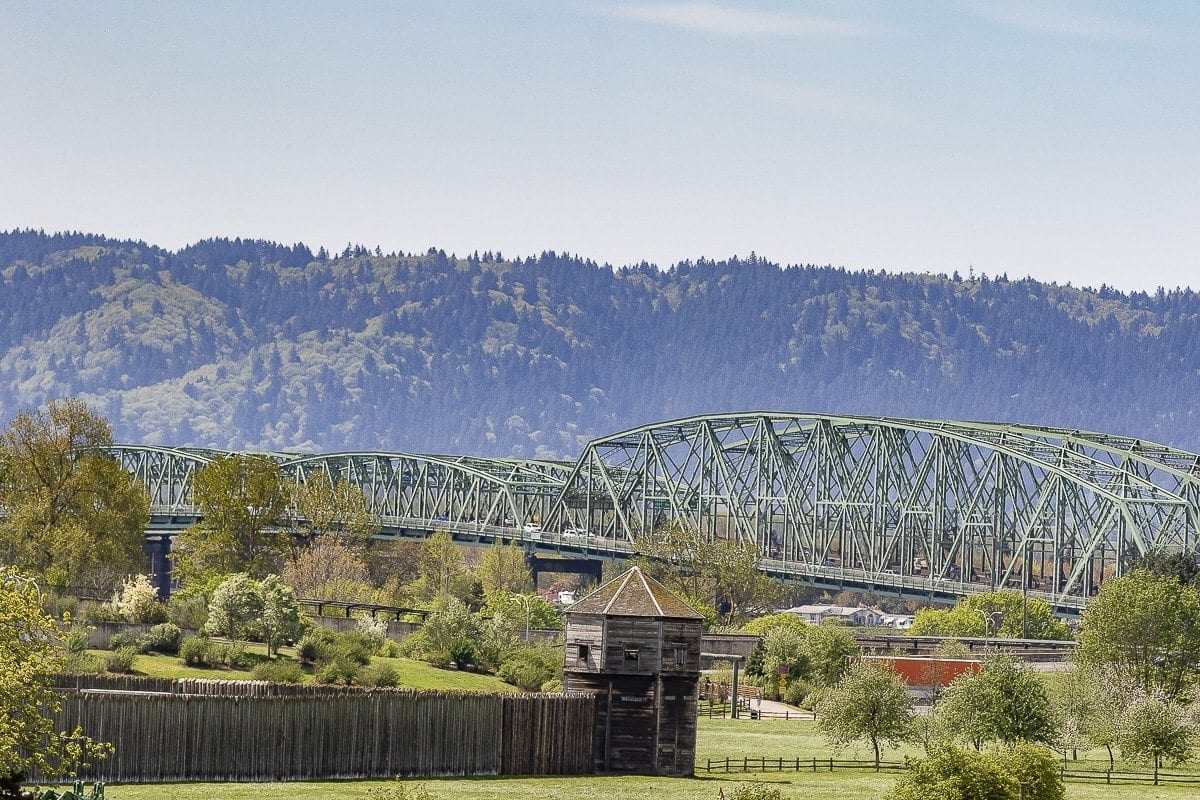 The Interstate Bridge is visible beyond Fort Vancouver on a sunny day in April. Photo by Mike Schultz