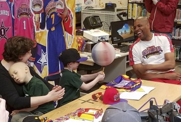 Twin brothers ‘signed’ by Harlem Wizards
