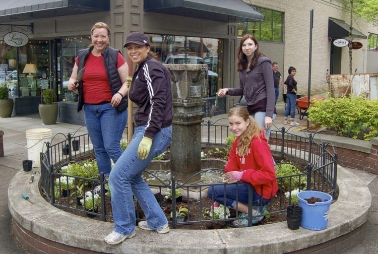 The annual spring cleanup and planting day in downtown Camas brings the community together in grassroots fashion to work together on, well, grass roots, among other things. Photo courtesy of Downtown Camas Association