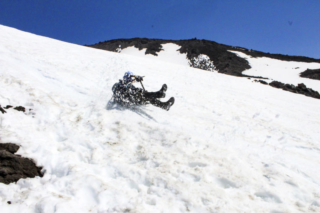A man glissades down the slopes of Mount St. Helens Tuesday A man glissades down the slopes of Mount St. Helens Tuesday. Photo by Eric Schwartz