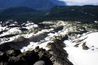 A rocky ridge acts as a path to many climbers on the way to the summit A rocky ridge acts as a path to many climbers on the way to the summit. Photo by Eric Schwartz