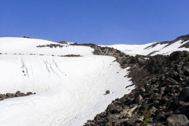 A rocky ridge points the way toward the summit of Mount St. Helens. Photo by Eric Schwartz
