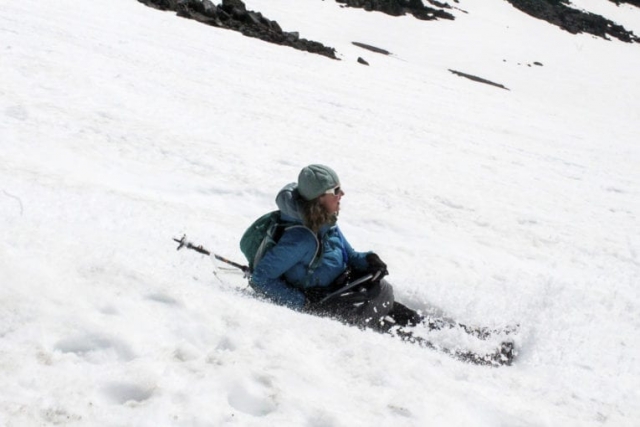 A woman glissades down Mount St. Helens Tuesday. Photo by Eric Schwartz