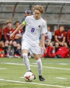 Jack Kolosvary, shown here earlier in the playoffs, scored both goals Saturday for Columbia River as the Chieftains won the Class 2A state championship in boys soccer. Photo by Mike Schultz