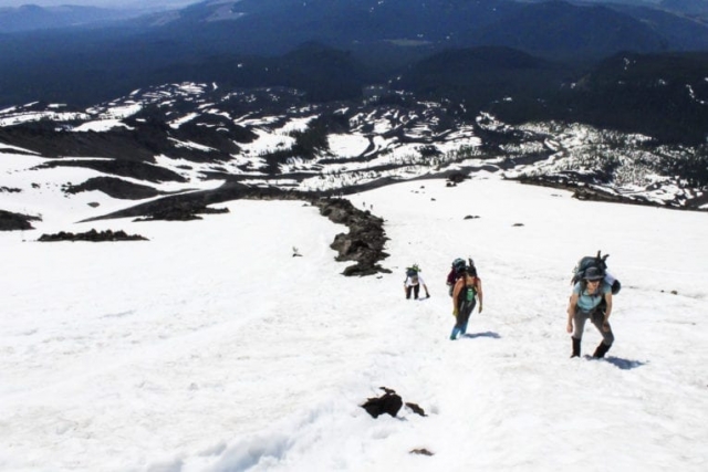 Climbers battle steep terrain en route to the summit of Mount St. Helens. Photo by Eric Schwartz