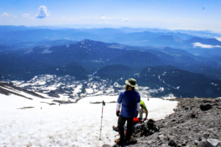 Hikers take a moment to appreciate the view Hikers take a moment to appreciate the view. Photo by Eric Schwartz